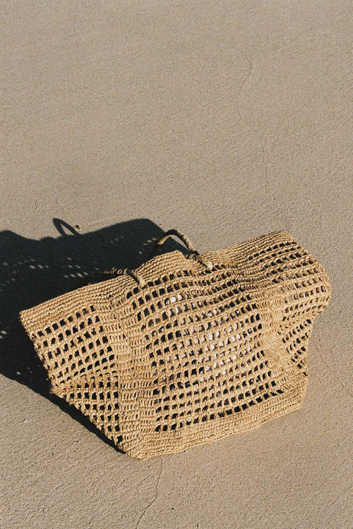 Large woven rattan shoulder bag